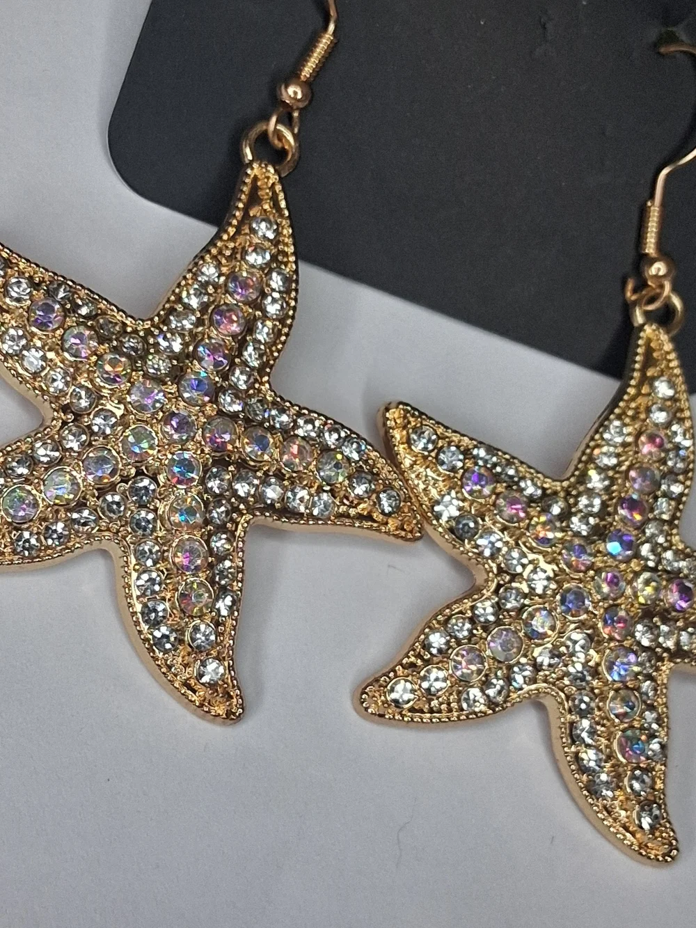 Gold Starfish Earrings with Iridescent Crystals